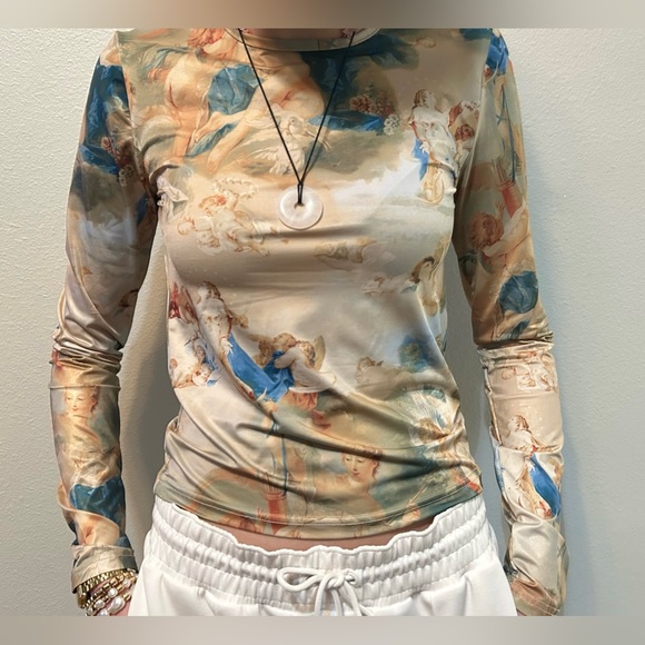 Silky cherub angel top - Picture 1 of 3